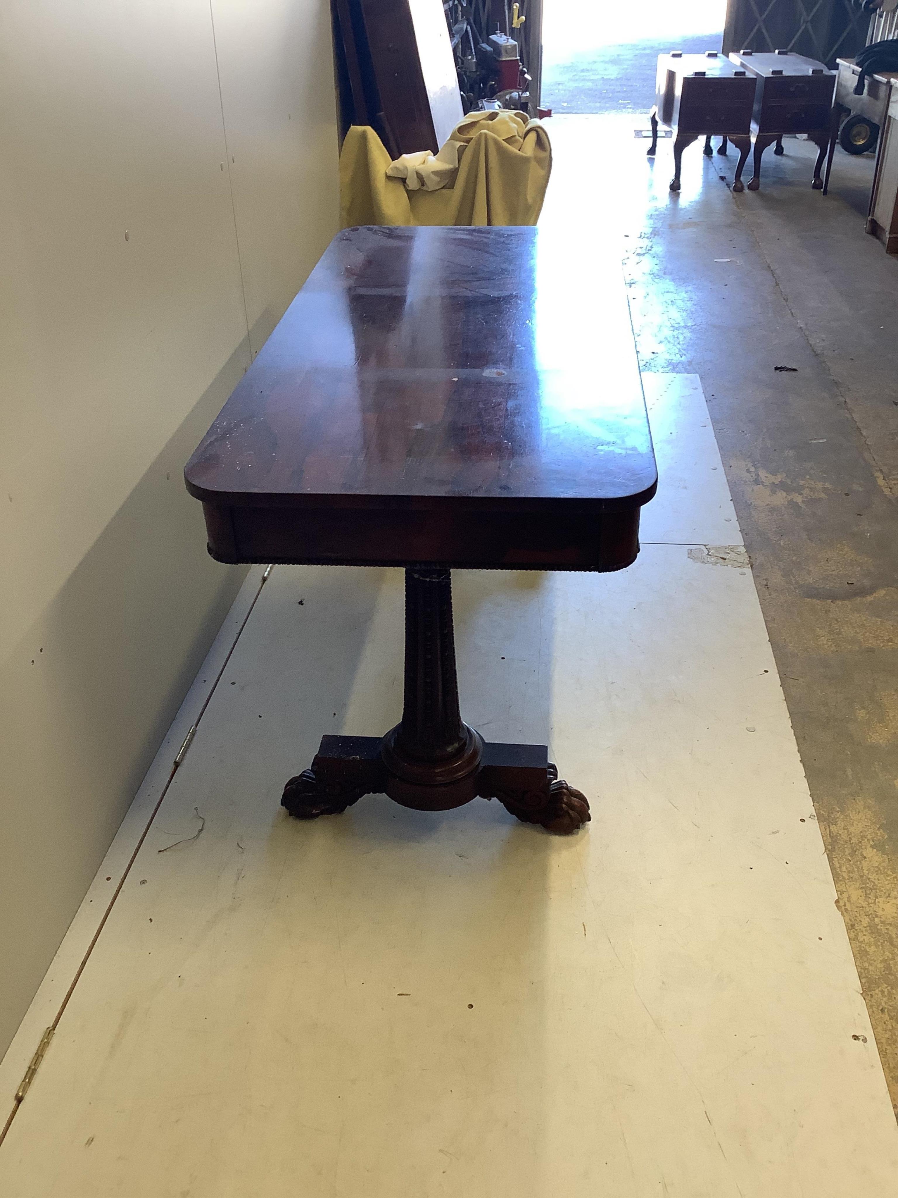 An early Victorian rosewood centre table, width 137cm, depth 64cm, height 72cm. Condition - fair